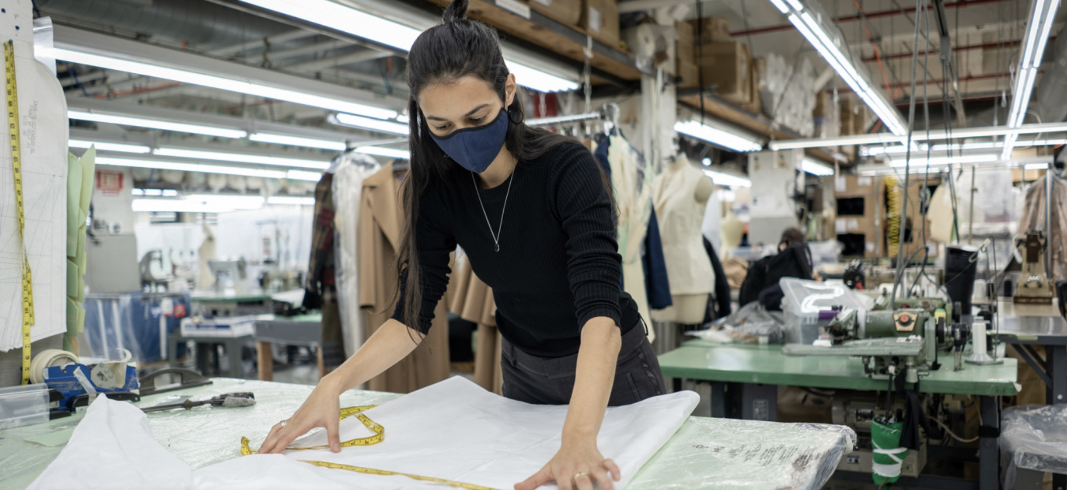 Photo of Gabrielle Ferrara working in a warehouse.