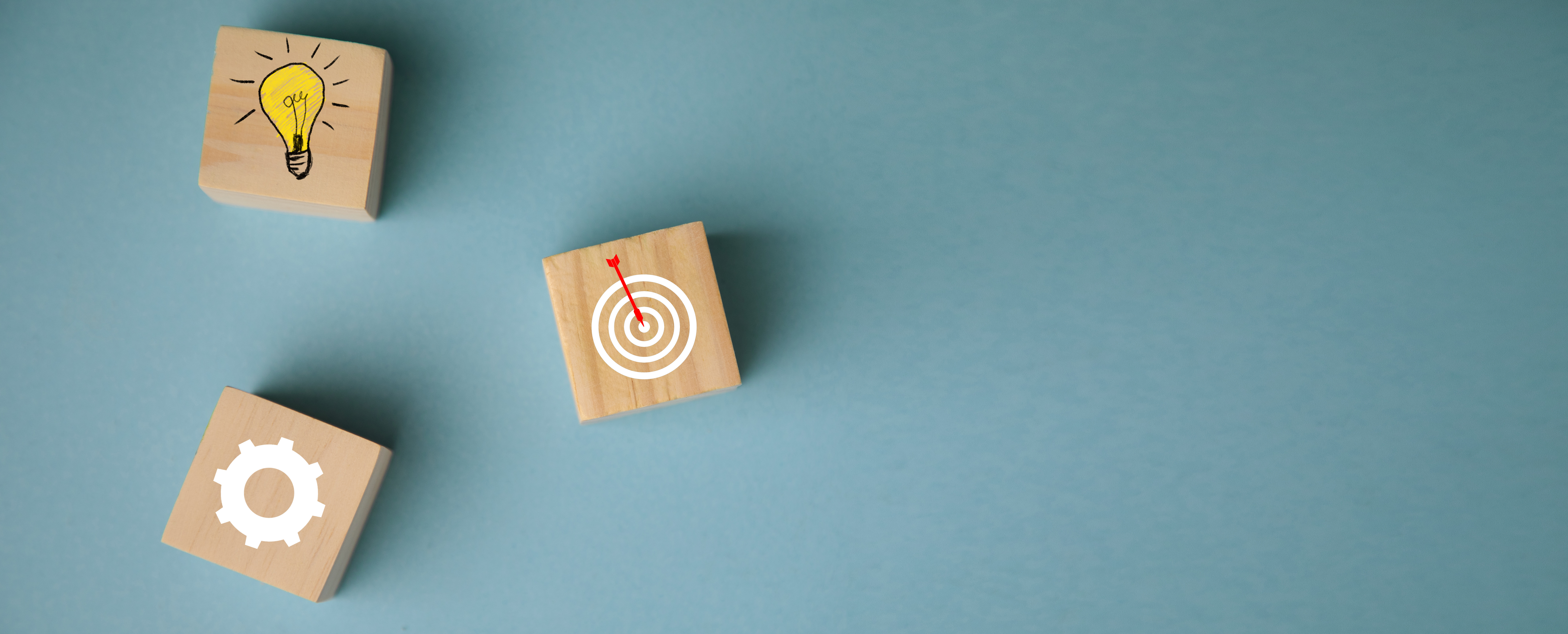 Photo of wooden blocks against a blue background